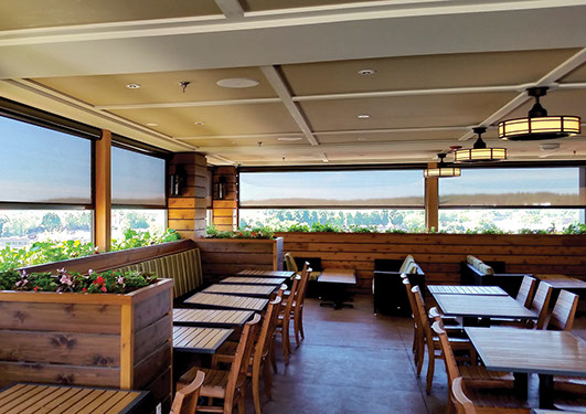a restaurant using FlexShade Zip Solar and Insect Screens